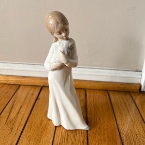 Lladro “Daisa Girl Holding Puppy Dog”
